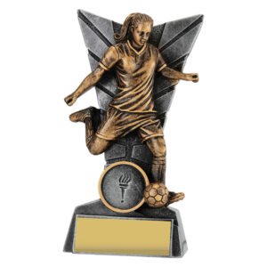 Small antique gold female soccer player trophy kicking ball with angular backdrop on resin base and gold engraving plate