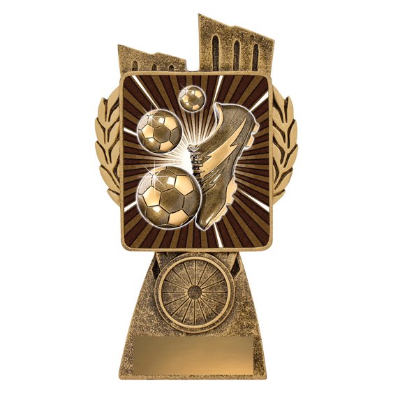 Small antique gold soccer trophy featuring raised boot and football detail on a radiating background panel, set on a tapered base with engraving plate.