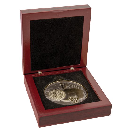 Round basketball medal featuring ball and hoop design, set inside a hinged wooden presentation box with black foam insert for display and protection.