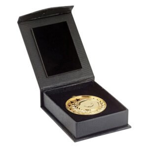 Black textured medal case with padded interior displaying a gold medal with soccer ball design and laurel detailing around the edge.