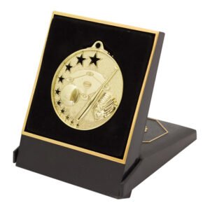 Black hinged presentation box with gold trim featuring a sports themed medal insert and front engraving plate for personalised award details.