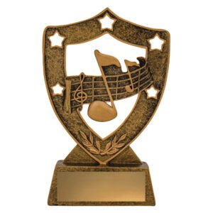 Small bronze music shield trophy with musical notes and staff design on base with engraved name plate