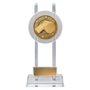 Small clear glass award with circular face featuring gold whistle emblem, mounted on twin glass pillars and a solid glass base with gold engraving plate.