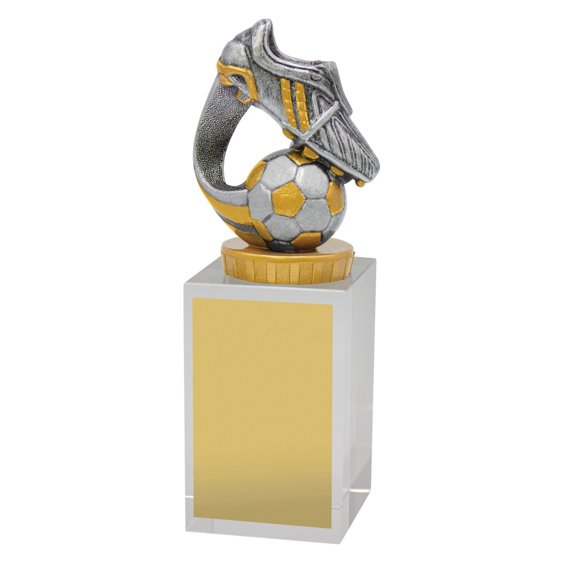 Medium clear crystal cube award with silver and gold soccer boot and ball figure on top and front engraving plate.
