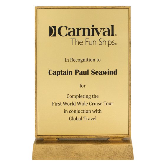 Gold engraved glass plaque award on display stand with printed recognition text