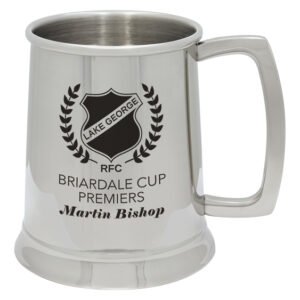 Stainless steel tankard mug with handle, polished finish, and custom engraved crest and text on front.