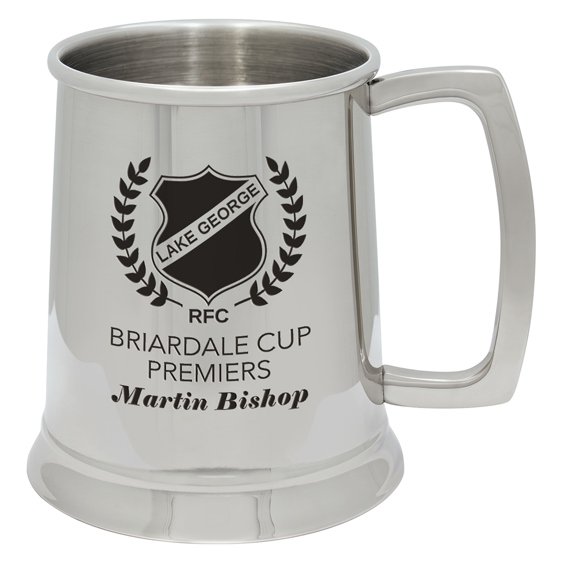 Stainless steel tankard mug with handle, polished finish, and custom engraved crest and text on front.