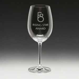 Engraved wine glass with rising star award text and logo design
