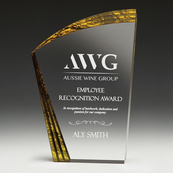 Clear glass corporate awards plaque with curved gold accent panel and engraved employee recognition text