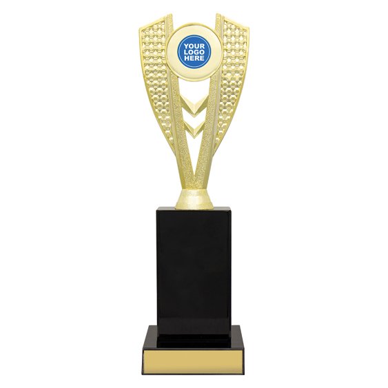 Extra large gold V shaped trophy with textured side panels, centre chevron detail and round logo insert on black base with gold engraving plate.