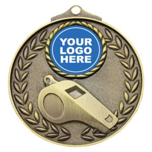Gold whistle medal with laurel wreath border and central logo insert area