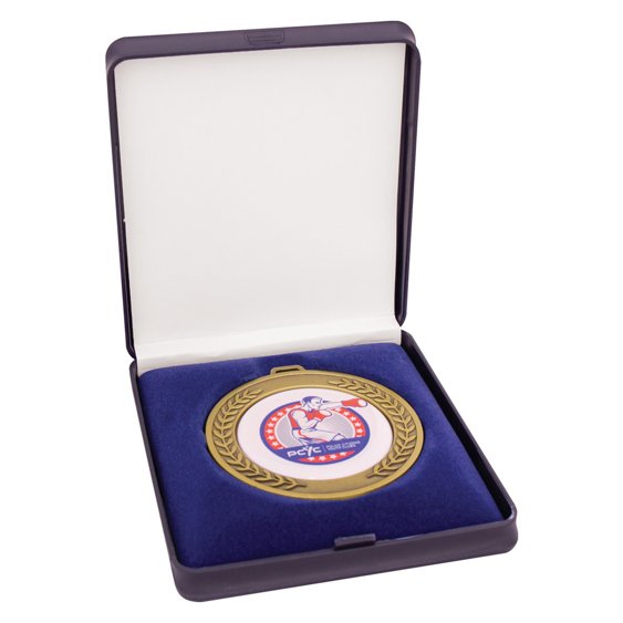 Navy velvet lined hinged medal presentation case with padded insert, designed to hold and display a standard 50mm medal securely.