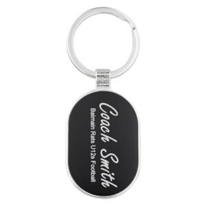 Oval metal engraved keyring with black insert and polished silver ring