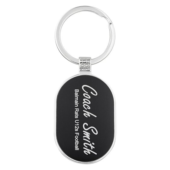 Oval metal engraved keyring with black insert and polished silver ring