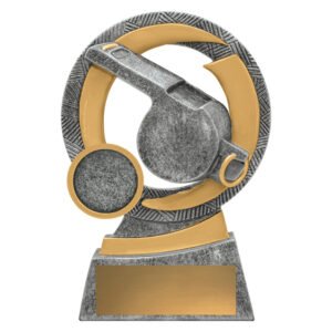 Small silver and gold referee whistle trophy inside circular frame with small round insert space and rectangular base with plaque.