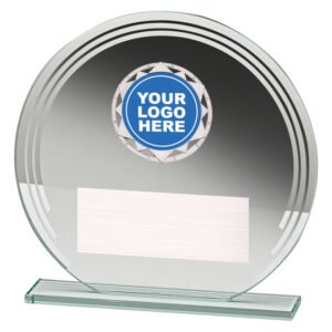 Small round clear glass award on a glass base featuring silver accent rings, insert logo space at top and brushed silver engraving plate for custom text.