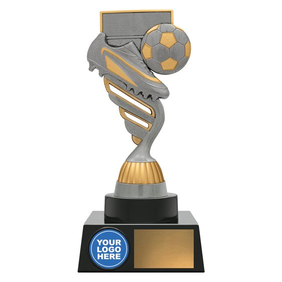 Medium silver and gold soccer trophy with spiral column, boot and ball in front of goal net, circular logo insert on base, and blank gold nameplate.
