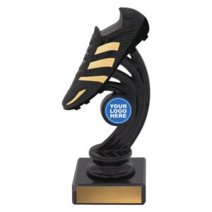 Small soccer boot swoosh column trophy in black and gold with circular centre logo insert and square black base with plaque.