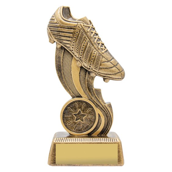Small antique gold soccer trophy featuring detailed football boot above curved swoosh design, round star emblem insert and gold engraving plate on textured base.