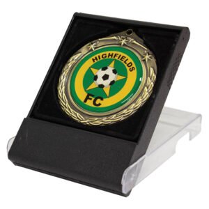 Soccer medal displayed in black presentation case with velvet insert