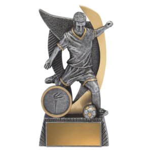 Small silver and gold soccer trophy featuring player in action with curved gold arc backdrop, front insert position and gold engraving plate on textured base.