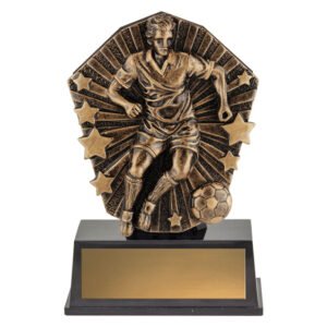 Antique gold soccer trophy with raised player figure and ball relief on black base.