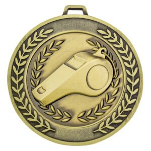 Gold soccer medal with referee whistle centred inside laurel wreath border and ribbon loop at top.