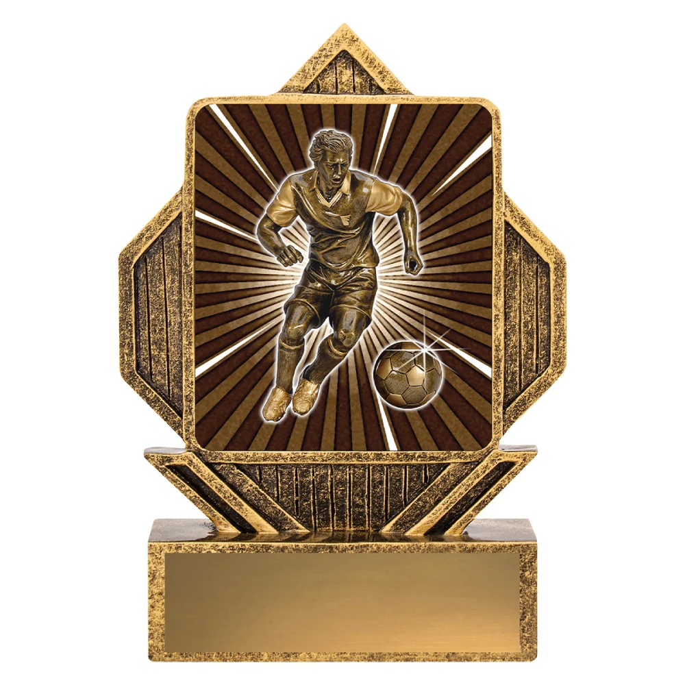 Gold resin soccer trophy with hexagon frame and player dribbling ball design