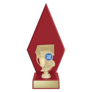 Large gold soccer trophy with boot, ball, goal net, and cup mounted on red diamond shaped panel base with engraving plate.