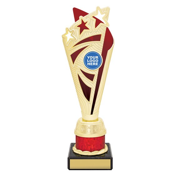 Small gold soccer trophy with three stars at top, red panel accents, tall column body, and black base with engraving plate.