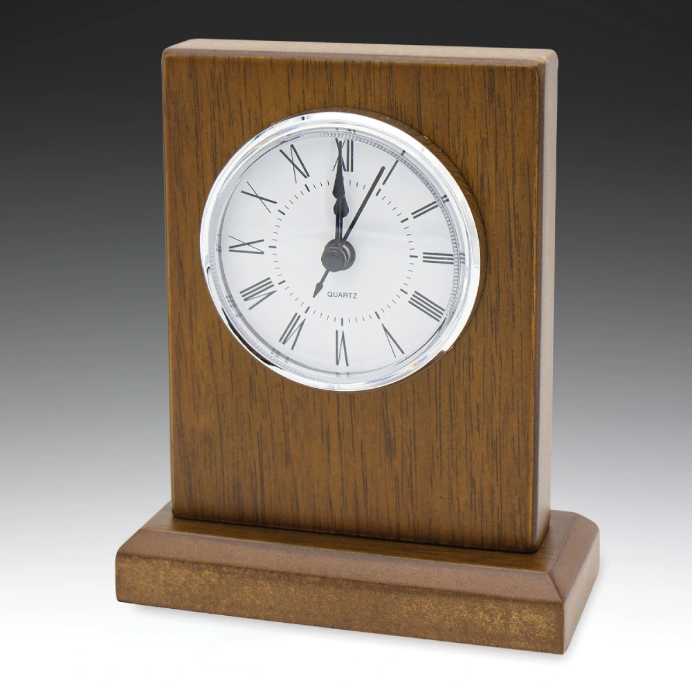 Rectangular wooden desk clock with white face and roman numerals on a solid base