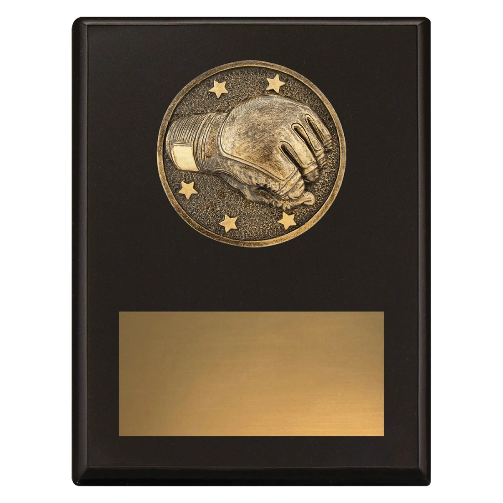Medium black wrestling award plaque with raised wrestling glove emblem and large gold engraving plate