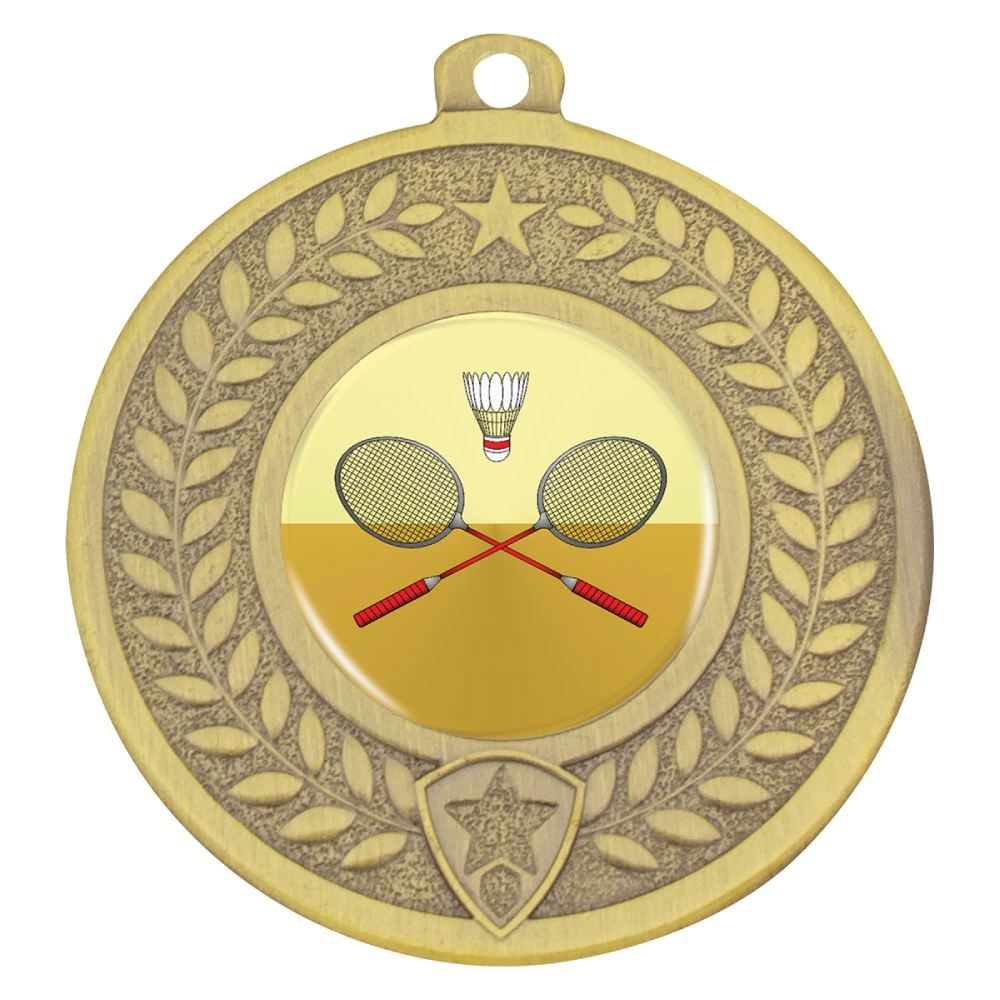 Round gold medal with embossed laurel wreath and star detail around the outer ring. Centre insert displays crossed badminton rackets and shuttlecock. Includes top loop for ribbon attachment.