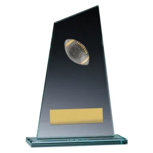 American football glass award with angled clear panel, football emblem, and engraving plate