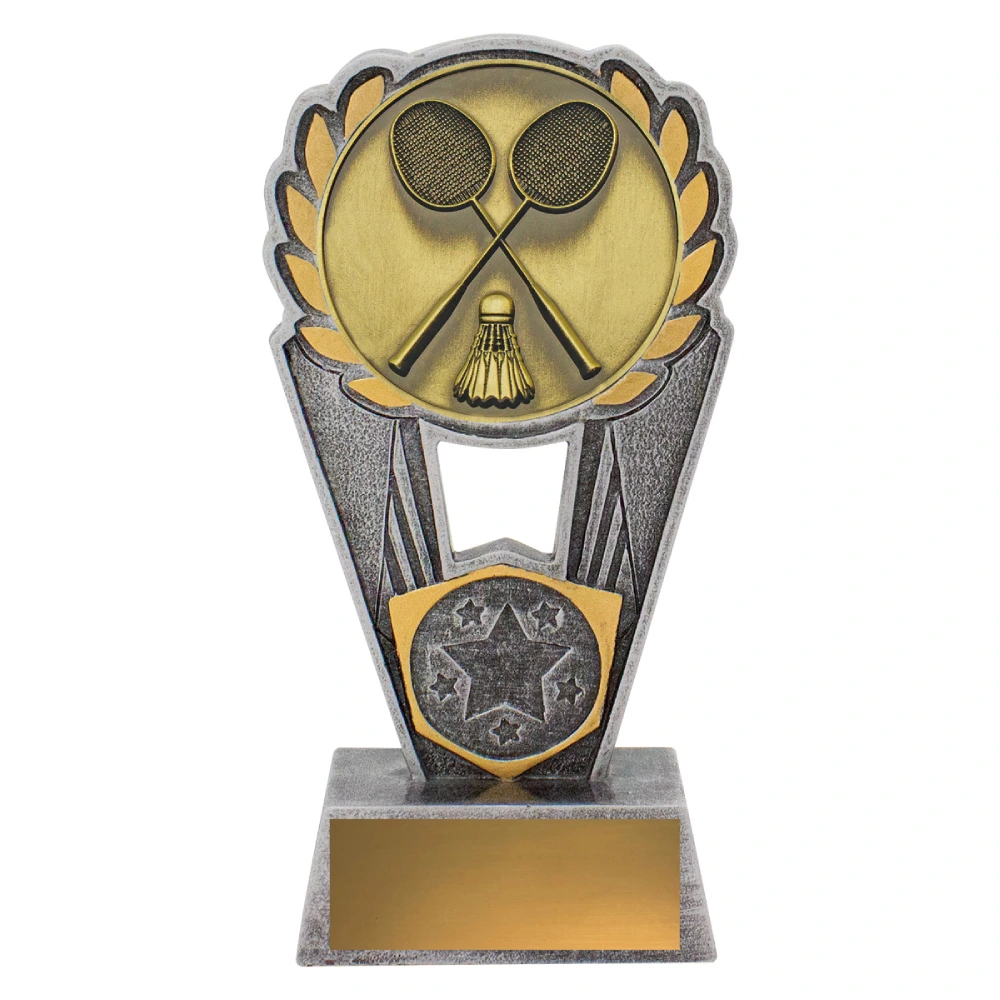 Small badminton resin trophy with laurel wreath top and shield design showing crossed rackets and shuttlecock on silver and gold base with engraving plate