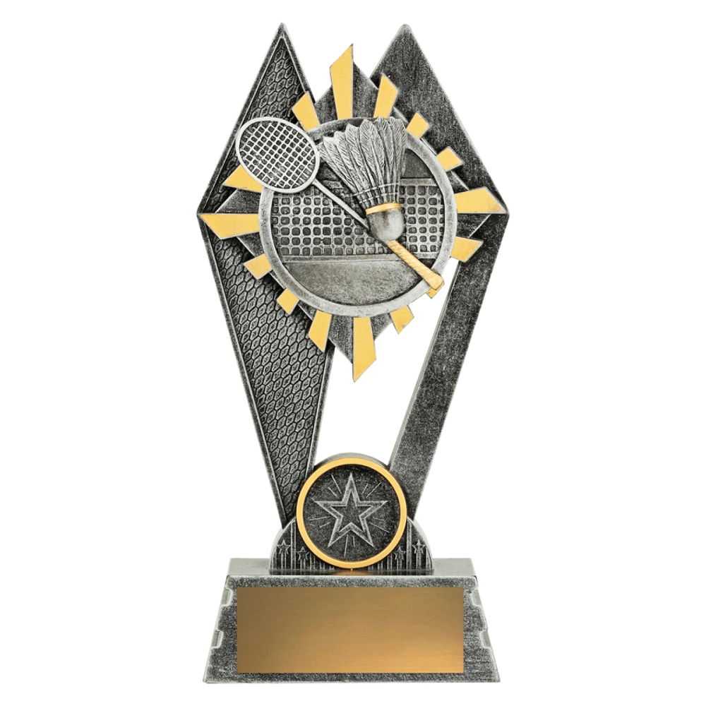 Small badminton resin trophy with silver and gold starburst design featuring racket shuttlecock and net on base with engraving plate