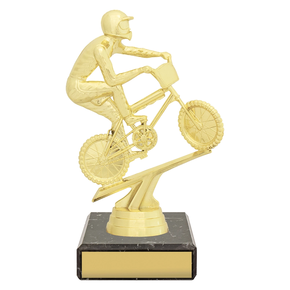 Gold BMX cycling trophy with rider on bike figure mounted on black marble base with engraving plate