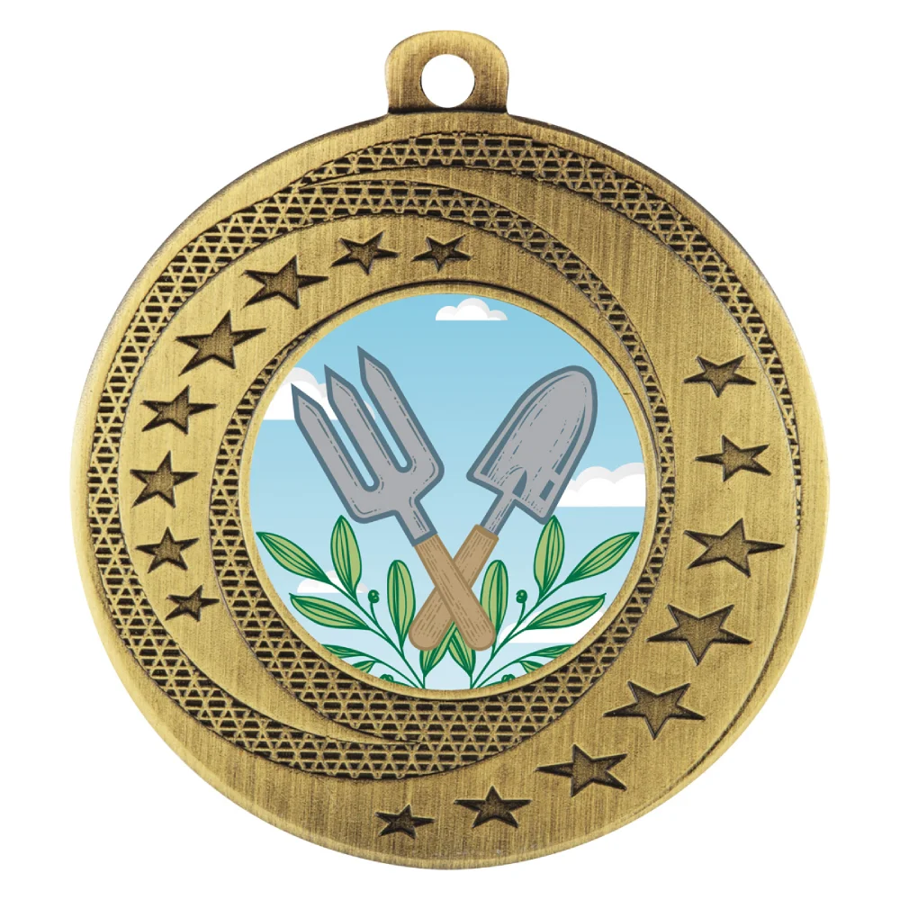 Gold textured star gardening medal with circular insert featuring crossed hand fork and trowel with leaf detail and patterned outer ring