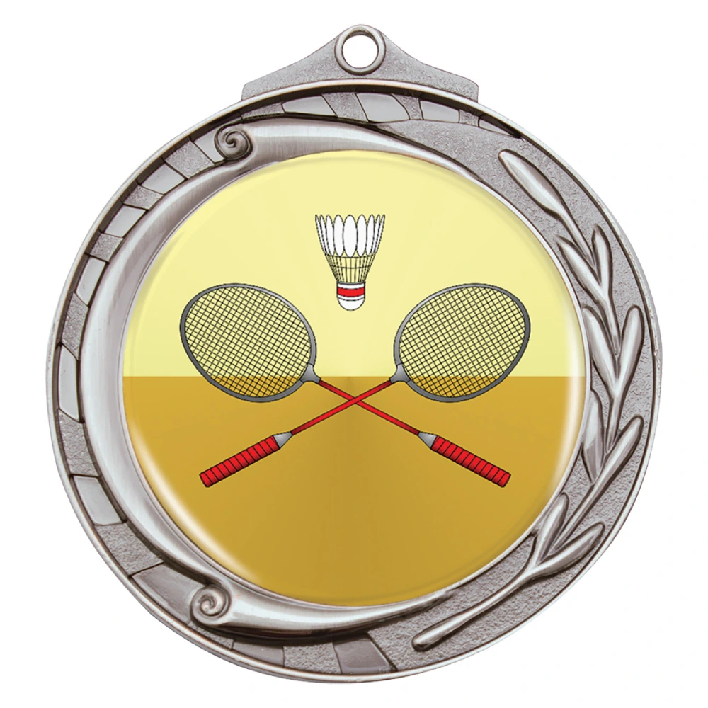 Round silver medal features a full colour insert with crossed rackets and shuttlecock. Swirl and laurel border detail with textured outer edge. Includes top loop for ribbon attachment.