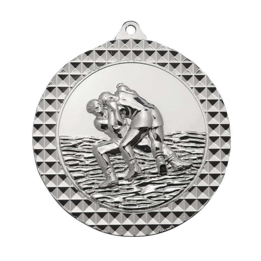 Silver wrestling medal with raised wrestling match scene and textured patterned border