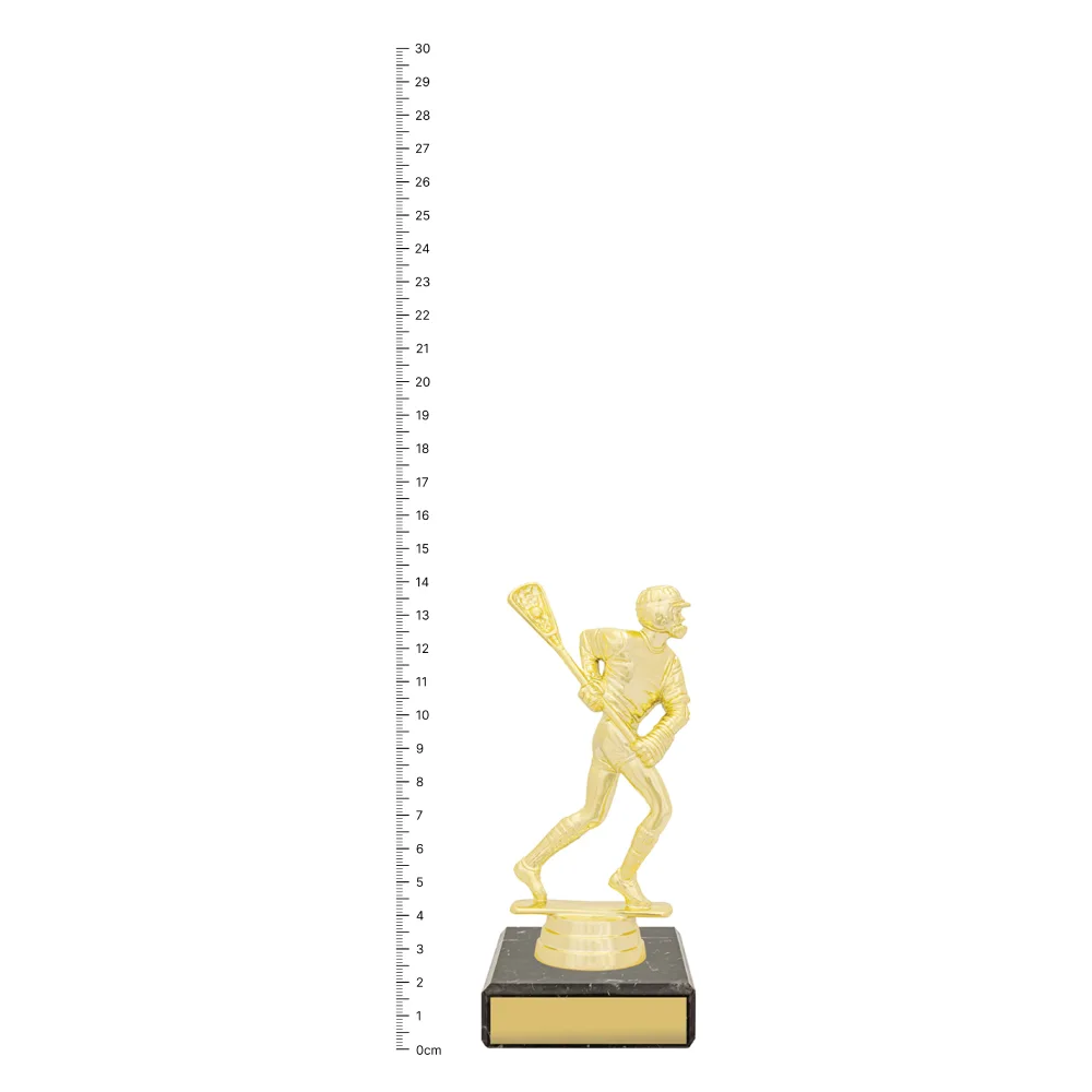 Figure Trophy - Lacrosse Lacrosse Figure Trophy next to ruler