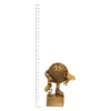 Football Character trophy next to ruler