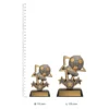 Football Tri-Star trophies next to ruler Football Tri-Star trophies next to ruler