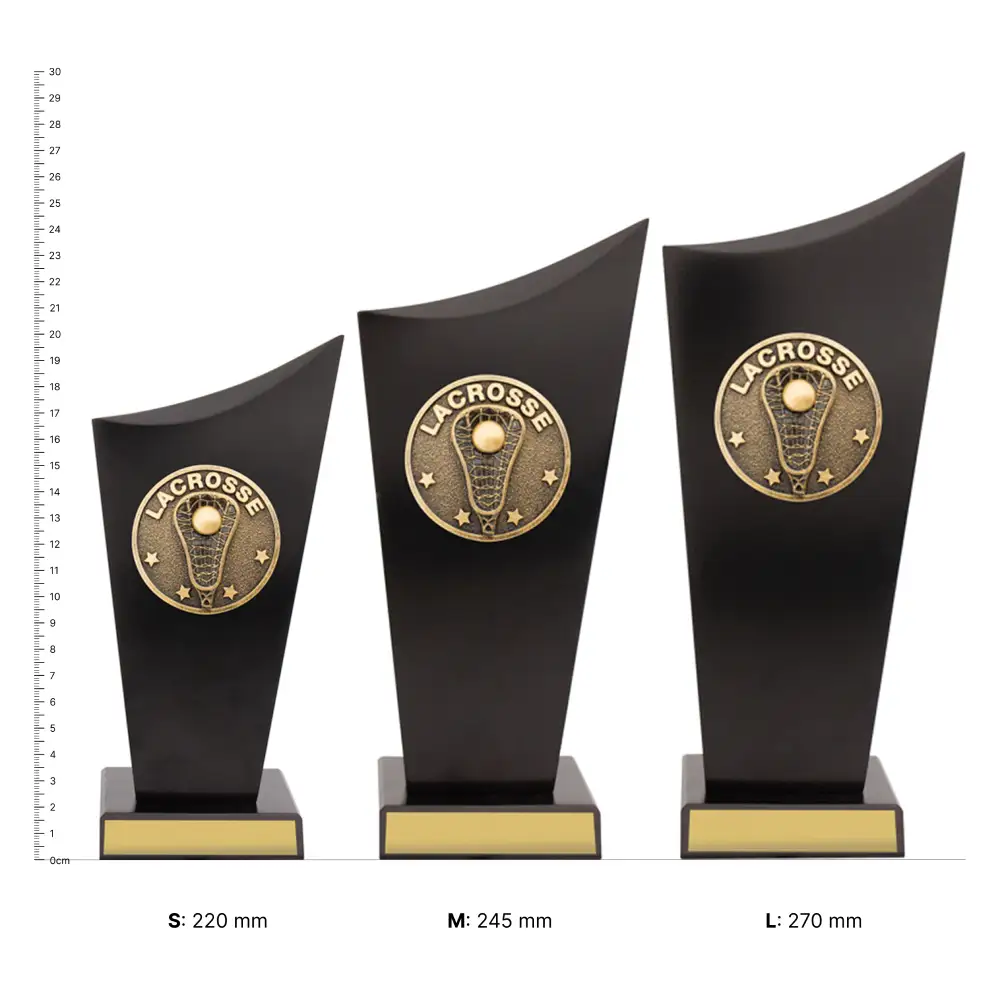 Lacrosse Spartan Crest Lacrosse Spartan Crest trophies next to ruler