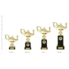 Lamp of Knowledge on Column trophies next to ruler