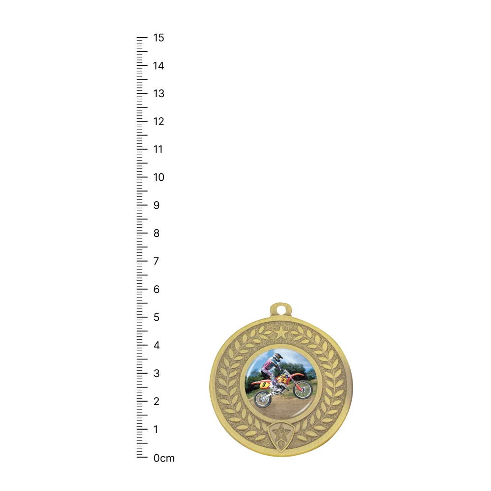 Motocross Distinction gold Motocross Distinction gold next to ruler