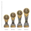 Music IKON trophies next to ruler