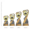 Revolver Arclight Colour trophies next to ruler