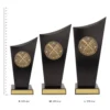 Rowing Spartan Crest trophies next to ruler