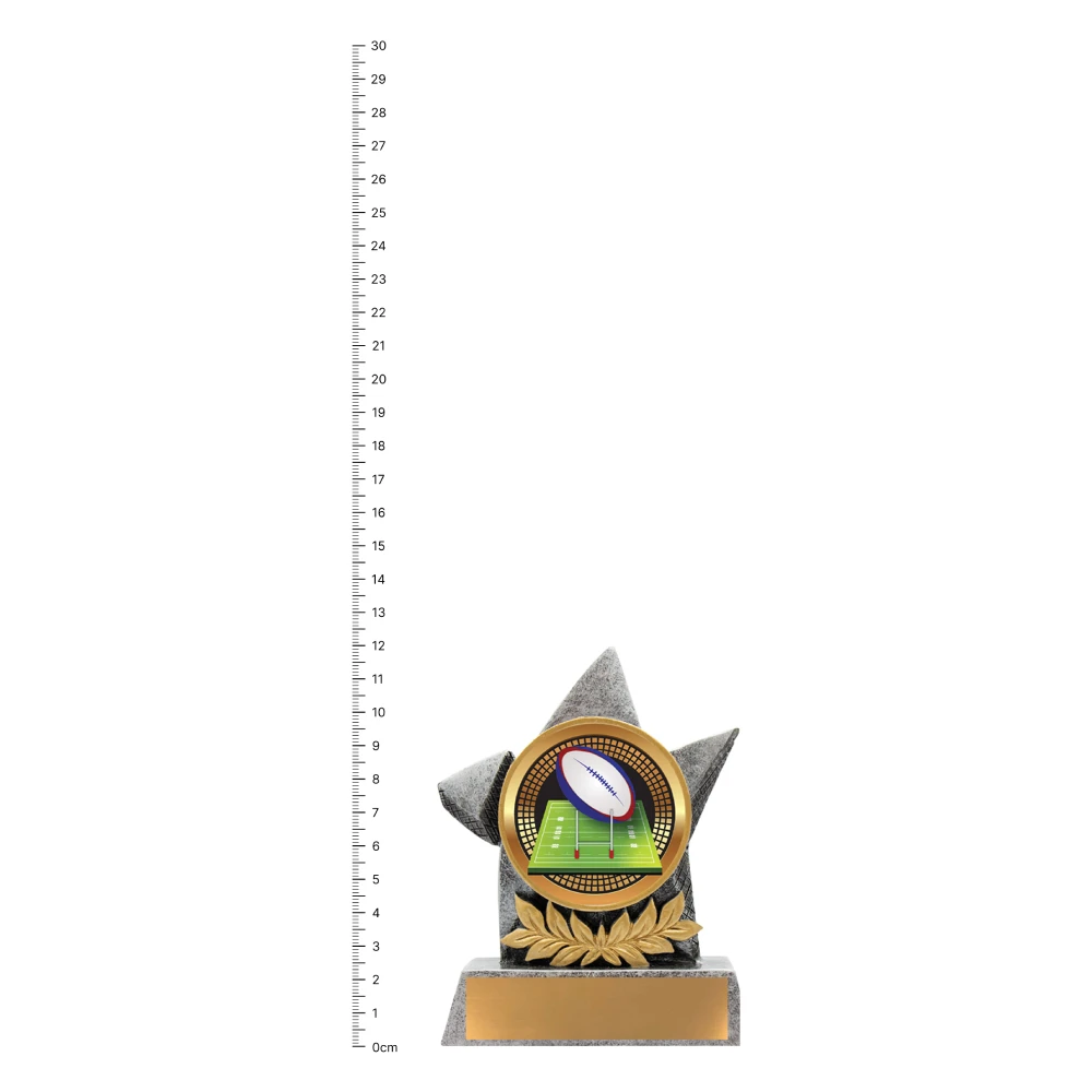 Rugby Argo trophy next to ruler Rugby Argo trophy next to ruler